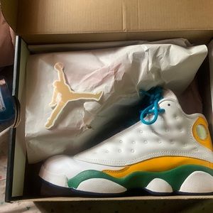 These shoes are the Jordan 13 retro KSA (PS)
